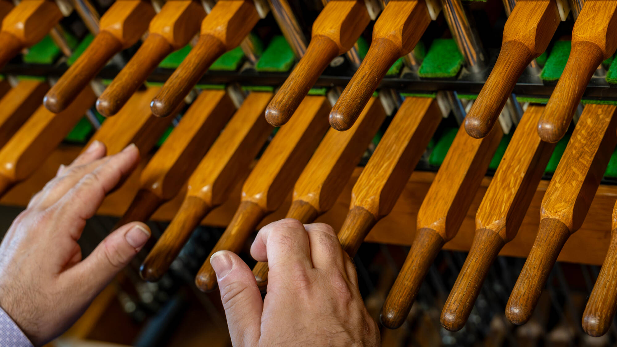 New GVSU carillonneur Jon Lehrer practices inside the Cook Carillon Tower on June 10.